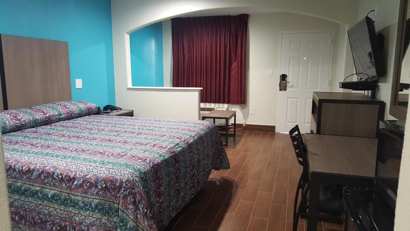 Moonlight Inn & Suites Jersey Village Værelse billede